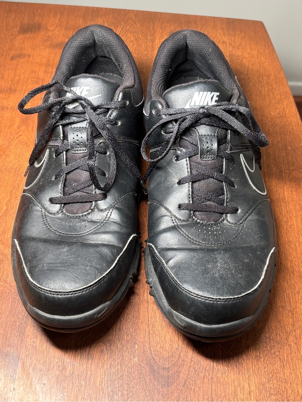 Nike Men's Black Leather Low-Top Sneakers with White Swoosh